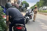 Nhiều người điều khiển xe máy ở TPHCM bị xử phạt do ngại đi đường vòng