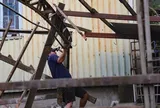 Cận cảnh người dân hối hả đập tường, lùi nhà để mở rộng đường 'nghẽn' nhất TPHCM