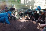 Phát hiện 3 hài cốt liệt sĩ cùng nhiều di vật trong vườn nhà dân