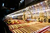 Giá vàng hôm nay 5-10: Vàng thế giới tăng nhẹ, vẫn loay hoay dưới 4.200 USD