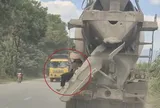 Người ngồi vắt vẻo trên xe trộn bê tông, tài xế bị phạt 28 triệu đồng