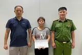 Lê Thị Nhàn 50 tuổi về Việt Nam đầu thú