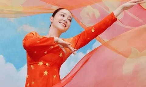 "Chim công làng múa" Linh Nga thướt tha áo dài, khoe nhan sắc tuổi 39
