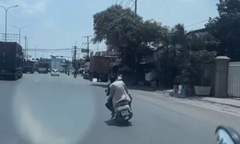 Clip 2 người đàn ông 'đầu trần', đánh võng trên quốc lộ gây bức xúc