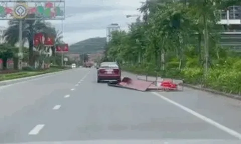 Xác minh ô tô kéo lê khung sắt, tấm tôn trên đường ở Quảng Ninh