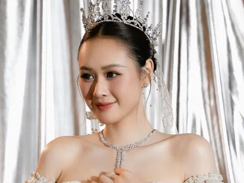 Anh Phạm diện váy cưới khoe vai trần gợi cảm, kể hôn nhân bên Anh Đức