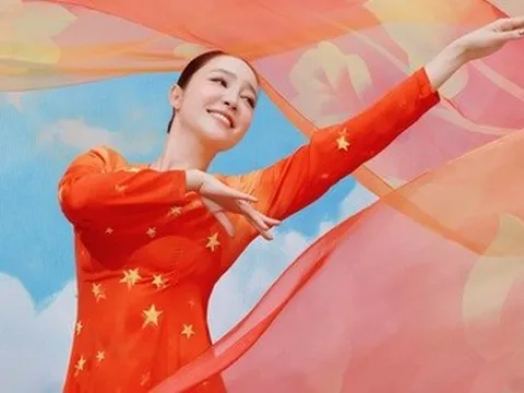 "Chim công làng múa" Linh Nga thướt tha áo dài, khoe nhan sắc tuổi 39