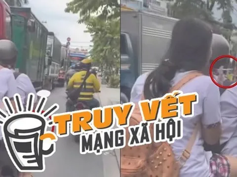 CLIP: Hai nữ sinh vừa chạy xe máy vừa hút thuốc ở TP HCM